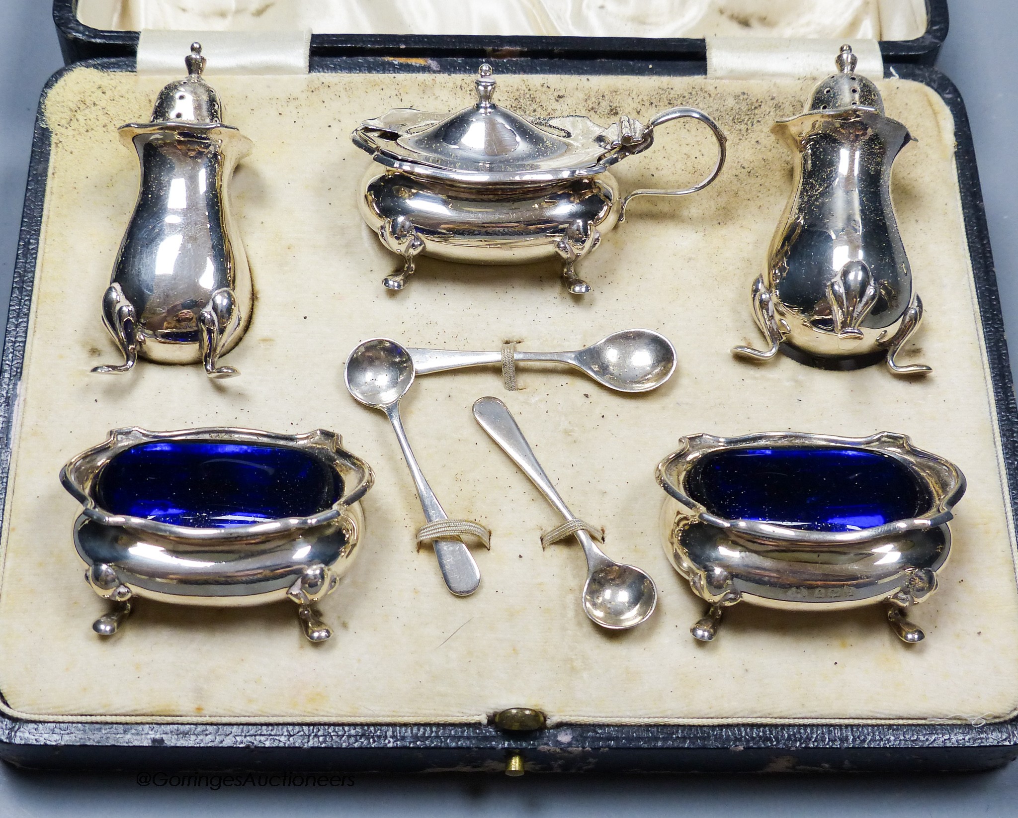 A 1920's cased silver five piece condiment set, Birmingham, 1926.